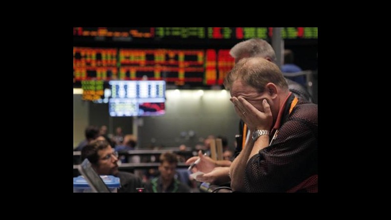 Wall Street in rosso, Fitch rovina la festa a Obama