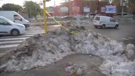 Maltempo Roma: strade invase da grandine e rifiuti