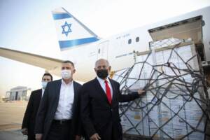 Israel Prime Minister Netanyahu attends the arrival of a plane with a shipment of vaccines