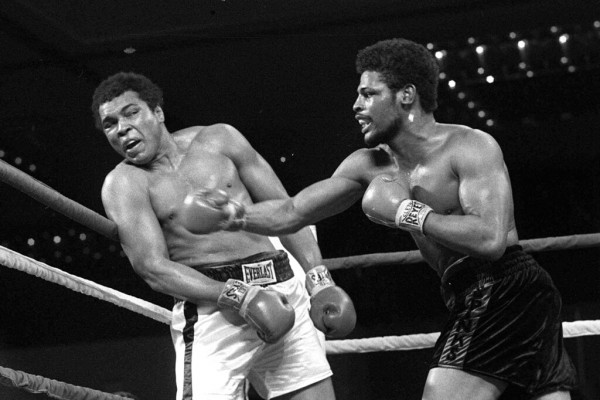 Leon Spinks, right, connects with a right hook to Muhammad Ali