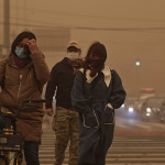 Cina: Pechino smog e tempesta di sabbia