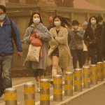 Cina: Pechino smog e tempesta di sabbia