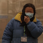Cina: Pechino smog e tempesta di sabbia