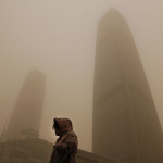 Cina: Pechino smog e tempesta di sabbia