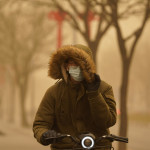 Cina: Pechino smog e tempesta di sabbia