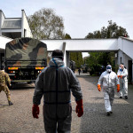 Arrivo al cimitero di Cinisello del trasporto di salme