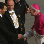 il Re di Siria Basher el Assad al suo arrivo ricevuto da sua eminenza Cardinale James Harvey