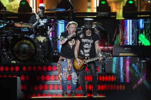Axel Rose, left and Slash of The Guns and Roses Metal band performs during the Vive Latino music festival in Mexico City