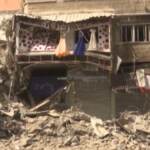 Gaza, negozianti ripuliscono strade ed esercizi dopo la tregua con Israele