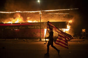 AP wins 2 Pulitzers for feature and breaking news photography