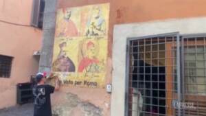 Roma, murales con i candidati sindaci in versione Santi: un invito a votare per gli indecisi