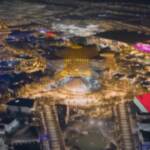 Expo Dubai, il volo notturno del drone sui padiglioni illuminati: il video è sensazionale