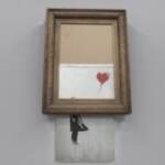 Va all’asta il Banksy che si autodistrusse, ‘Love is in the Bin’