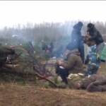 Migranti bloccati al confine tra Polonia e Bielorussia, tende e giacigli di fortuna