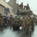 D-Day, la parata a Sainte-Mere-Eglise, il primo villaggio liberato
