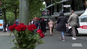 Berlin: candles, flowers and flags at half-mast after Charlottenburg car murder