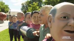 G7: In Germany, protests begin as Oxfam demonstrators wear masks of world leaders