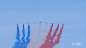 France: With red, white and blue smoke France celebrates Bastille Day