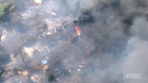 U.K.: In Wennington, homes destroyed by wildfires, residents forced to count damage