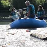 A Torino la #trashchallenge, Po ripulito con canoe e gommoni