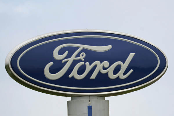Ford 4Q profit drops 90%, company says more cost cuts coming