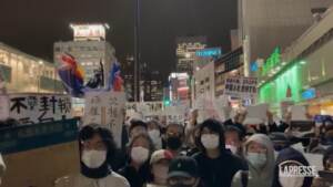 Tokyo, giapponesi sostengono proteste anti-lockdown in Cina