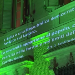 Senato, facciata illuminata con l’Articolo 1 della Costituzione