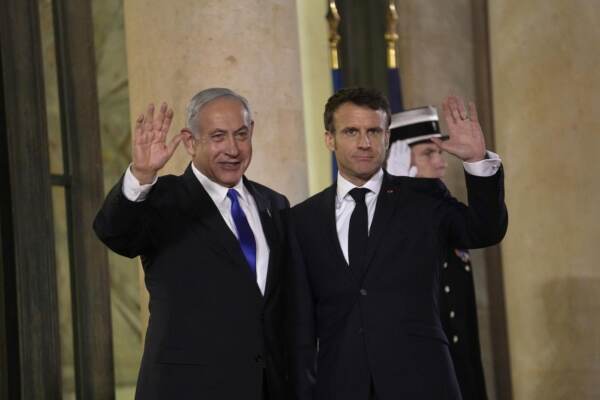 Netanyahu visits France amid spike in Mideast tensions