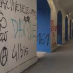 Milano, corteo antifascista: scritte per Dax e Cospito sui muri