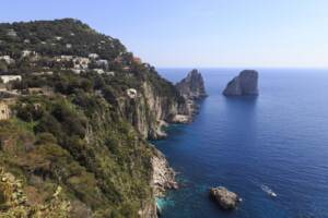 VIEW TO LIMESTONE PINNACLES OF FARAGLIONI ROCKS FROM GIARDINI DI AUGUSTO