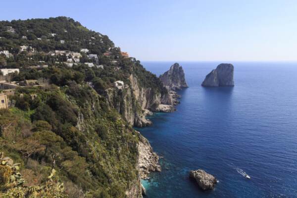 VIEW TO LIMESTONE PINNACLES OF FARAGLIONI ROCKS FROM GIARDINI DI AUGUSTO