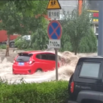 Cina, alluvioni nel Nord: voli cancellati