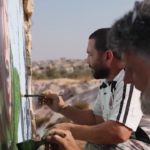 Siria, artisti anti-Russia dipingono murale con caricatura Prigozhin