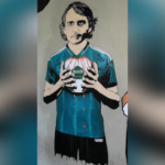 Calcio, Mancini e Bin Salman con pallone insanguinato in murales a San Siro