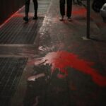 Roma, attivisti imbrattano strada con vernice rossa