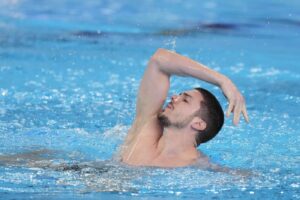 Giorgio Minisini in gara ai mondiali di nuoto sincronizzato a Doha
