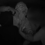 Roma, rapinano taxi con maschera da clown: le immagini
