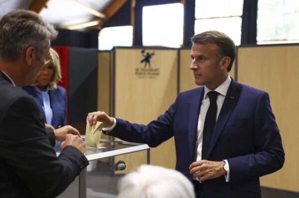 Elezioni Europee 2024 - Il voto del presidente francese Emmanuel Macron e sua moglie Brigitte