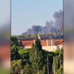 Lisbona, incendio vicino l’aeroporto: grande colonna di fumo nero