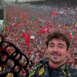 F1, Leclerc trionfa a Monza: migliaia di fan della Ferrari invadono la pista