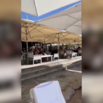 Israele, un bagnino annuncia la morte del leader di Hezbollah Nasrallah: festeggiamenti in spiaggia
