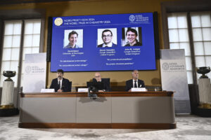 Nobel, premio per la chimica a David Baker, Demis Hassabis e John Jumper