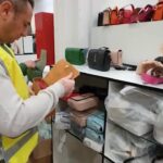 Bologna, sequestrati oltre 20mila capi di abbigliamento e accessori contraffatti