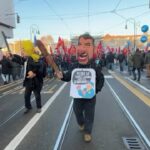 Sciopero generale 29 novembre, a Torino in corteo le maschere di Meloni e Salvini