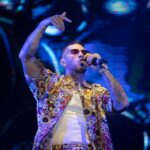 Emis Killa indagato, il rapper rinuncia a Sanremo 2025