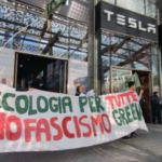 Milano, blitz degli attivisti di Extinction Rebellion al negozio Tesla in Gae Aulenti