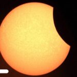 Eclissi solare parziale, le immagini: la Luna sembra mangiare un pezzo di Sole