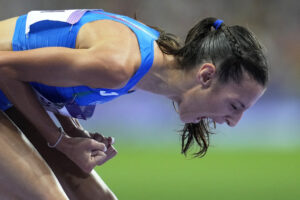 Nadia Battocletti, of Italy, reacts after winning the silver medal in the women's 10000 meters final at the 2024 Summer Olympics, Friday, Aug. 9, 2024, in Saint-Denis, France. (AP Photo/Ashley Landis)