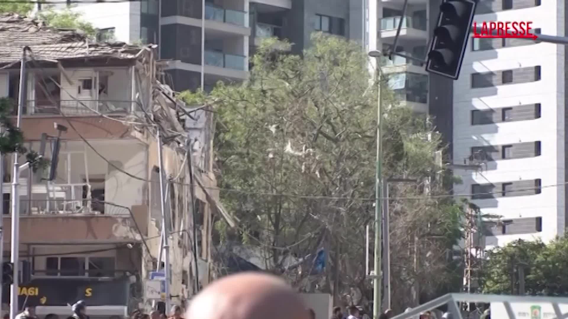 missili iraniani su israele palazzi danneggiati a tel aviv le immagini