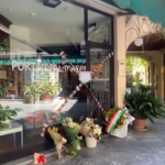 Busto Arsizio, fiori all’ingresso del negozio luogo dell’omicidio: le immagini